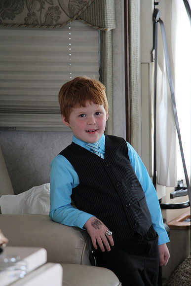 This is how a suave young man looks getting ready for the wedding in Grandma and Grandpa motorhome.