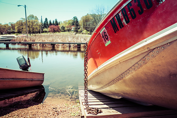 Fishing boats at the water's edge   Lake Minnetonka Minnetonka Beach Minnesota